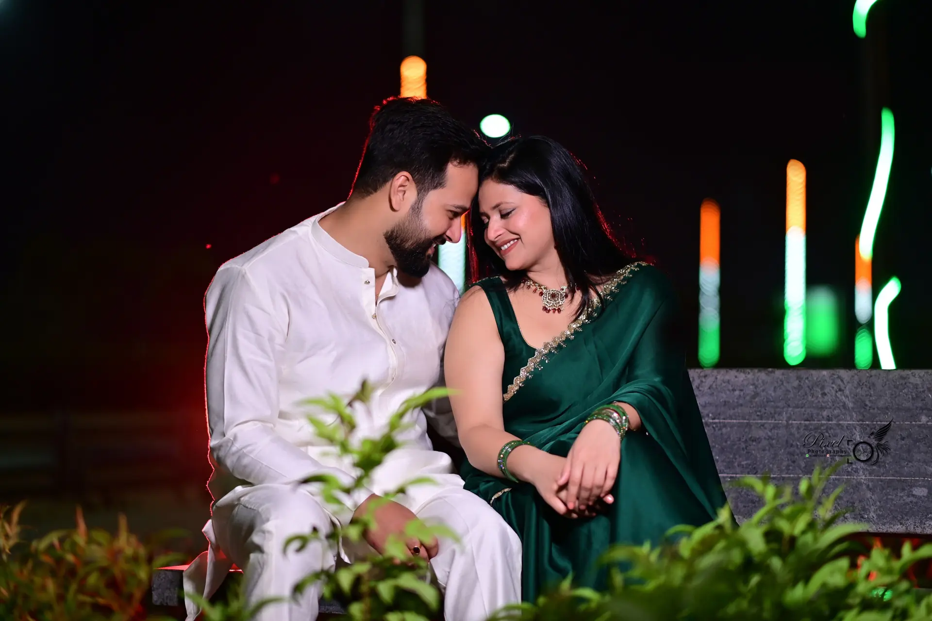 Couple portrait in emerald saree
